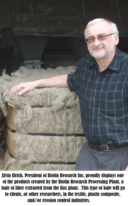 Alvin Ulrich by bale of flax fiber